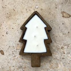 Christmas tree shaped candle with wooden base