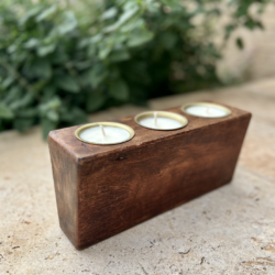 Wooden candle holder with three candles